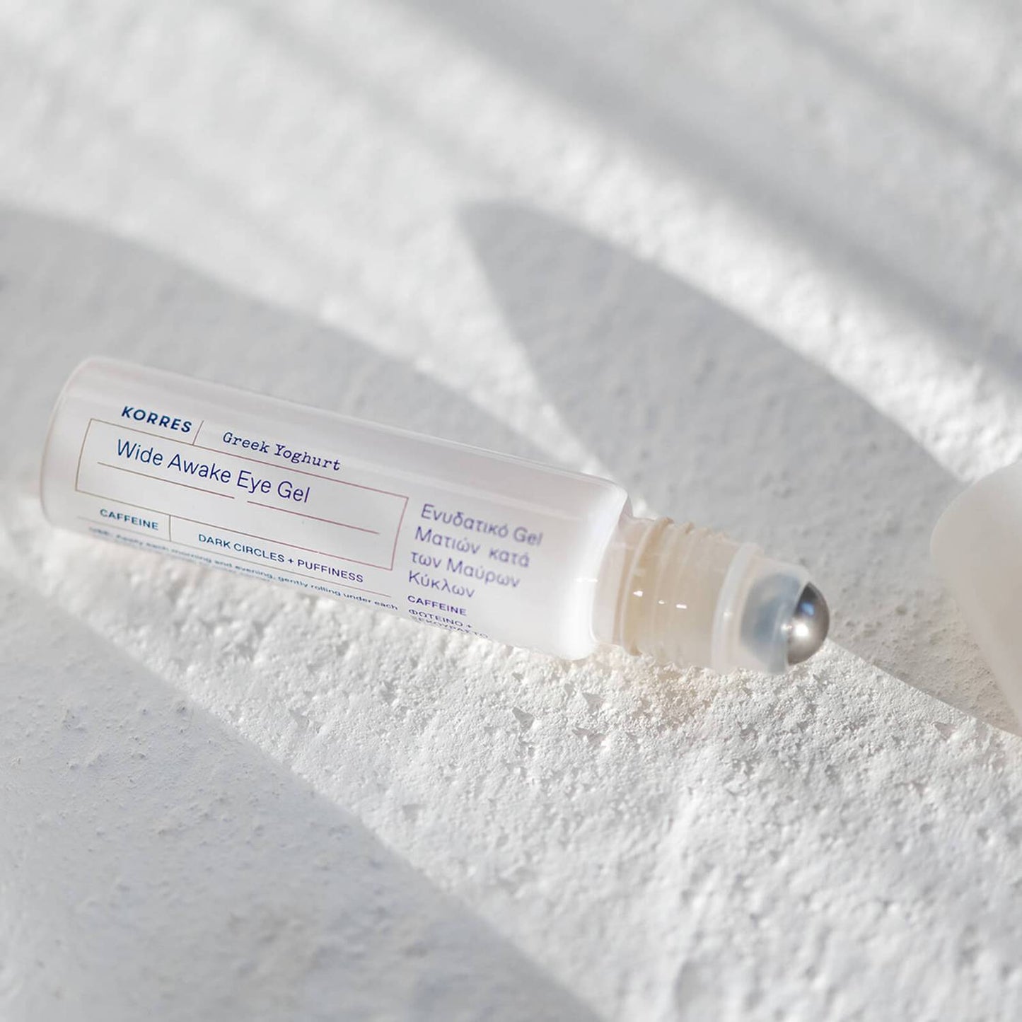 Korres Greek Yoghurt Wide Awake Eye Gel is a 97% natural origin roll-on eye gel containing nourishing Greek Yoghurt and caffeine