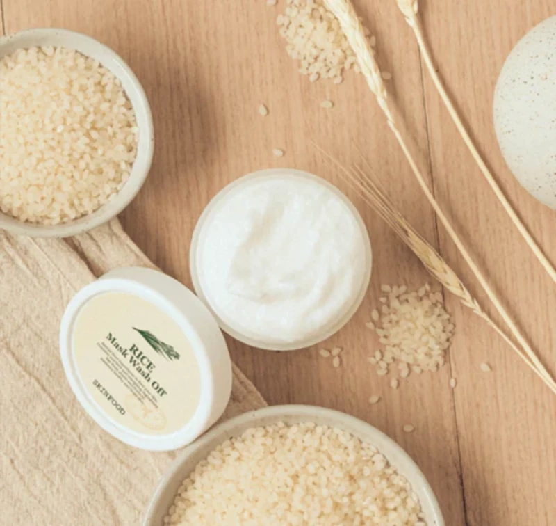 SKINFOOD Rice Mask Wash Off is suitable for all skin types, offering a soft and mochi-like texture that adheres to the skin for a gentle massage.