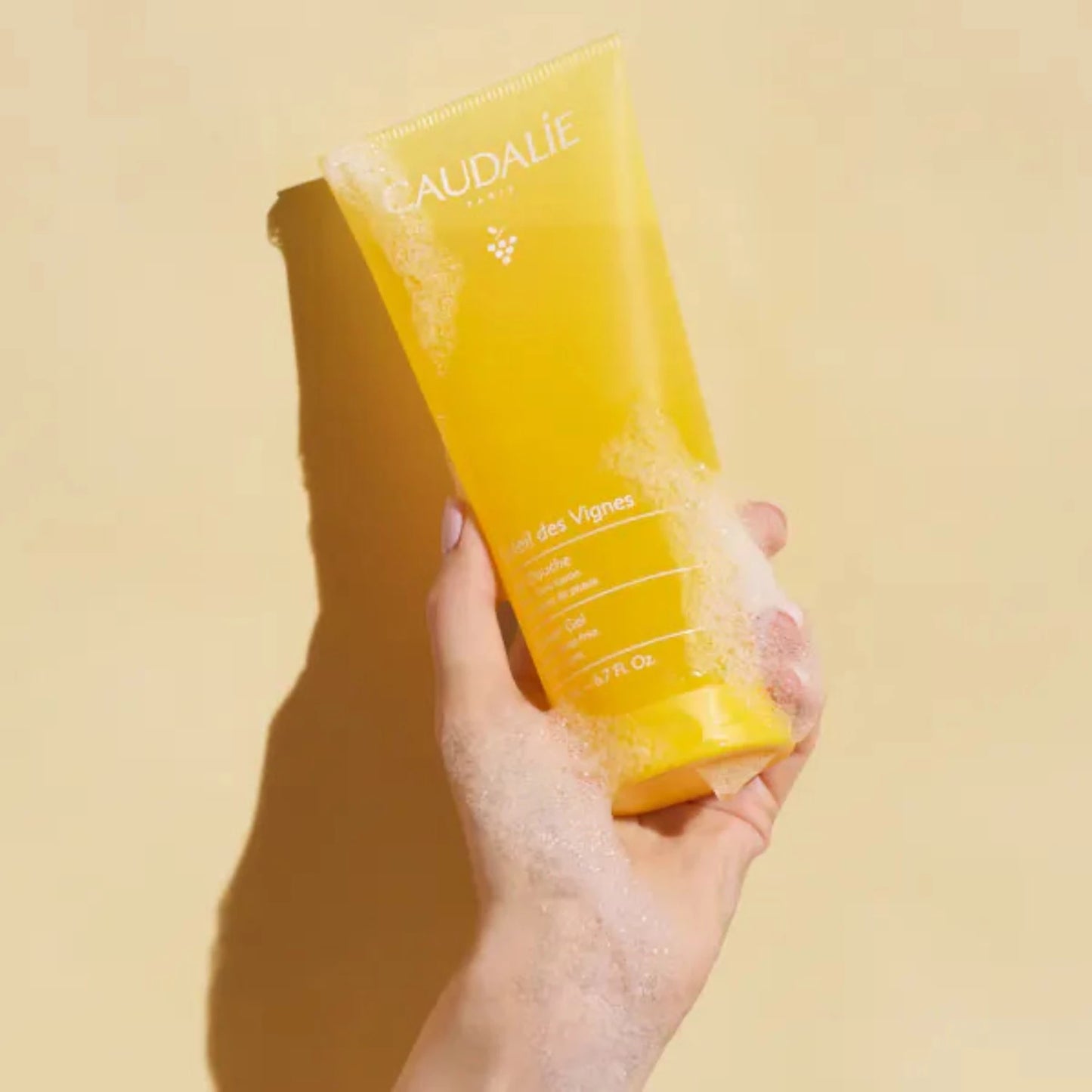 Caudalie Soleil des Vignes Shower Gel leaves the skin with sunny notes of orange blossom water, jasmine, and coconut