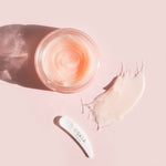 Open jar of Oskia Renaissance Mask with swatch and spatula