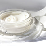 Open jar of Oskia Bedtime Beauty Boost night cream