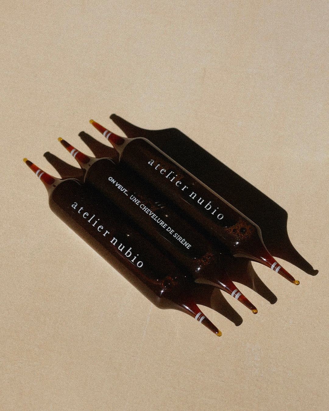 Atelier Nubio Mermaid Hair & Nails, S'il Vous Plait ampoules flat lay