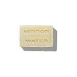 MIRROR WATER Shea Butter Brick solid cleansing bar packshot with embossed logo