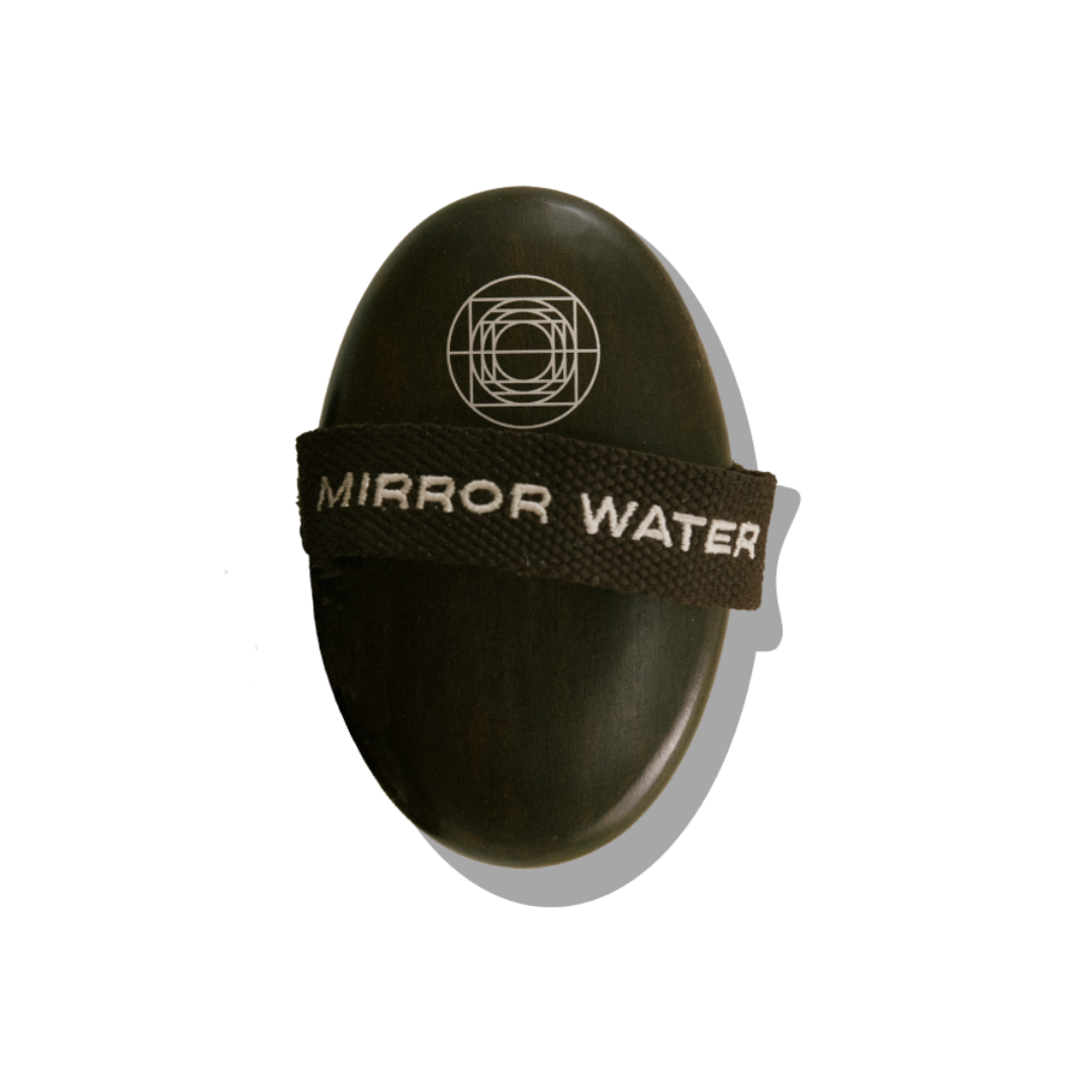MIRROR WATER Ultra-Soft BUFF Body Dry Brush packshot showing the dark beech wood back, engraved circular mark and branded strap