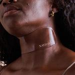 NAYDAYA Neck Wrinkle Shield silicone patch worn on a model's neck