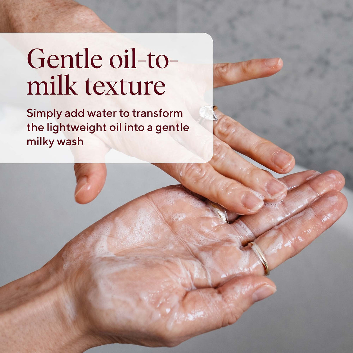 NAYDAYA Victory Cleanse Wash oil-to-milk texture in the palm of a hand