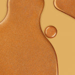 Nuxe Shimmering Dry Oil Huile Prodigieuse texture is enhanced with mineral-derived golden pearly particles, and the formula is vegan, containing no animal-derived ingredients or derivatives.