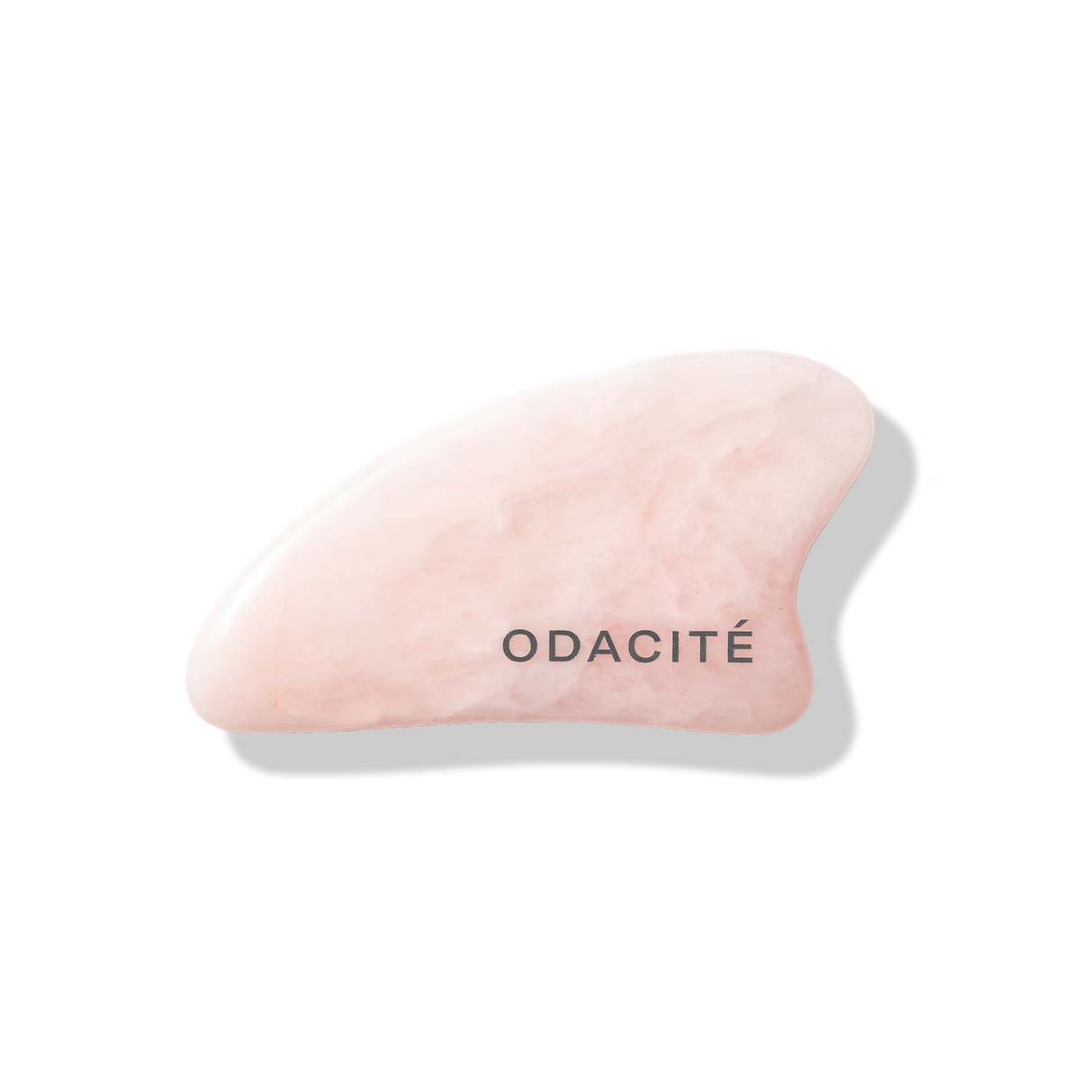 Odacité Crystal Contour Gua Sha Rose Quartz stone on white